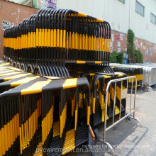 Powder coated yellow crowd control barrier